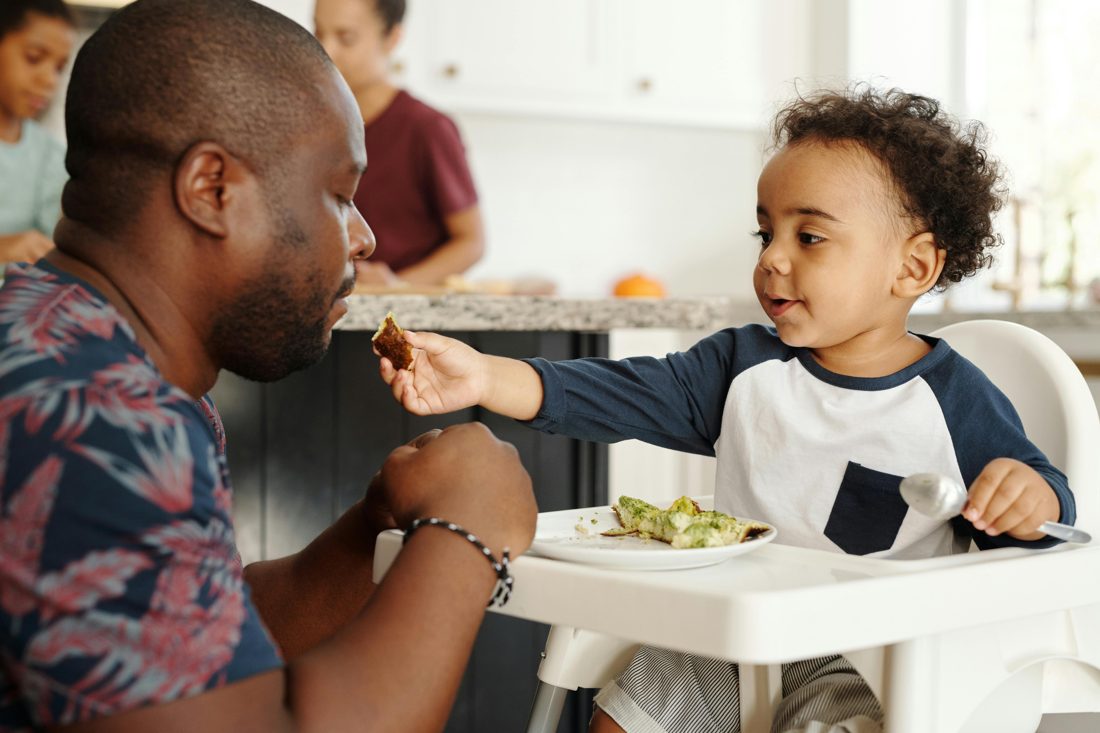 A parent and toddler sharing a moment together